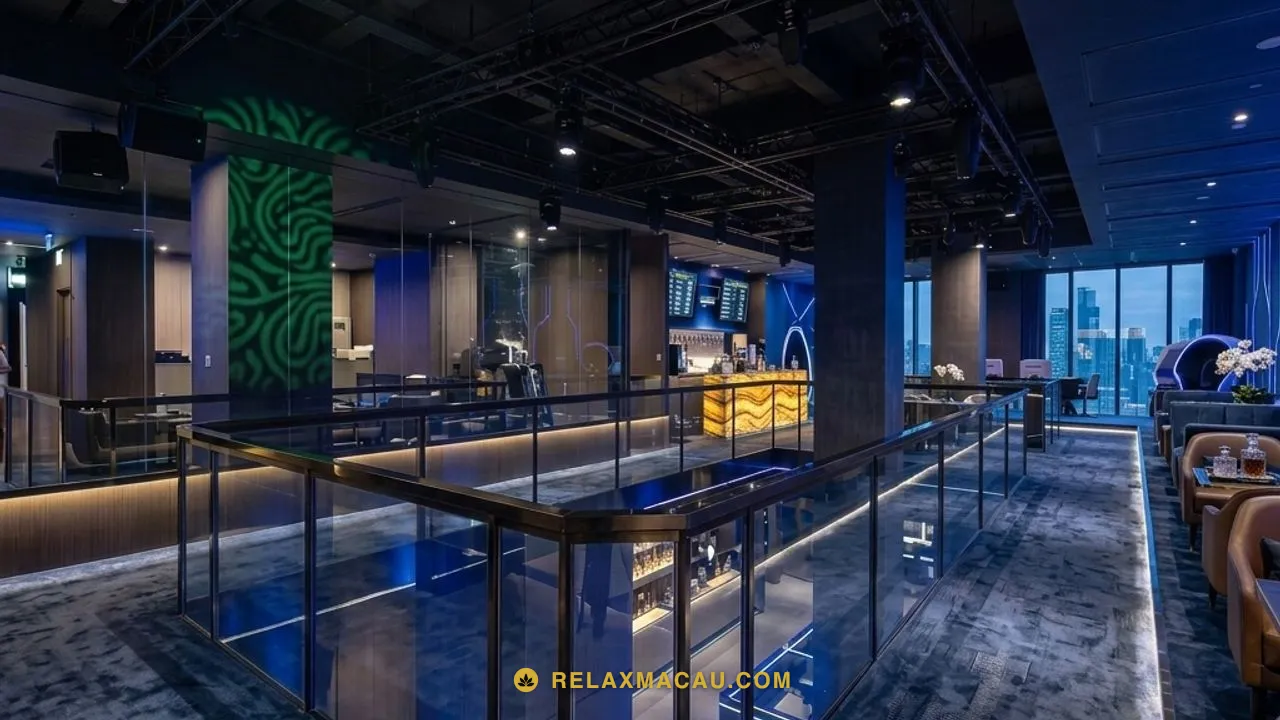 Macau sauna Manhao Spa's runway hall, multi-level glass-railed walkways lit in deep blue neon, with the floor below in full view